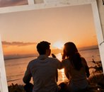 Two people watching the sunset
